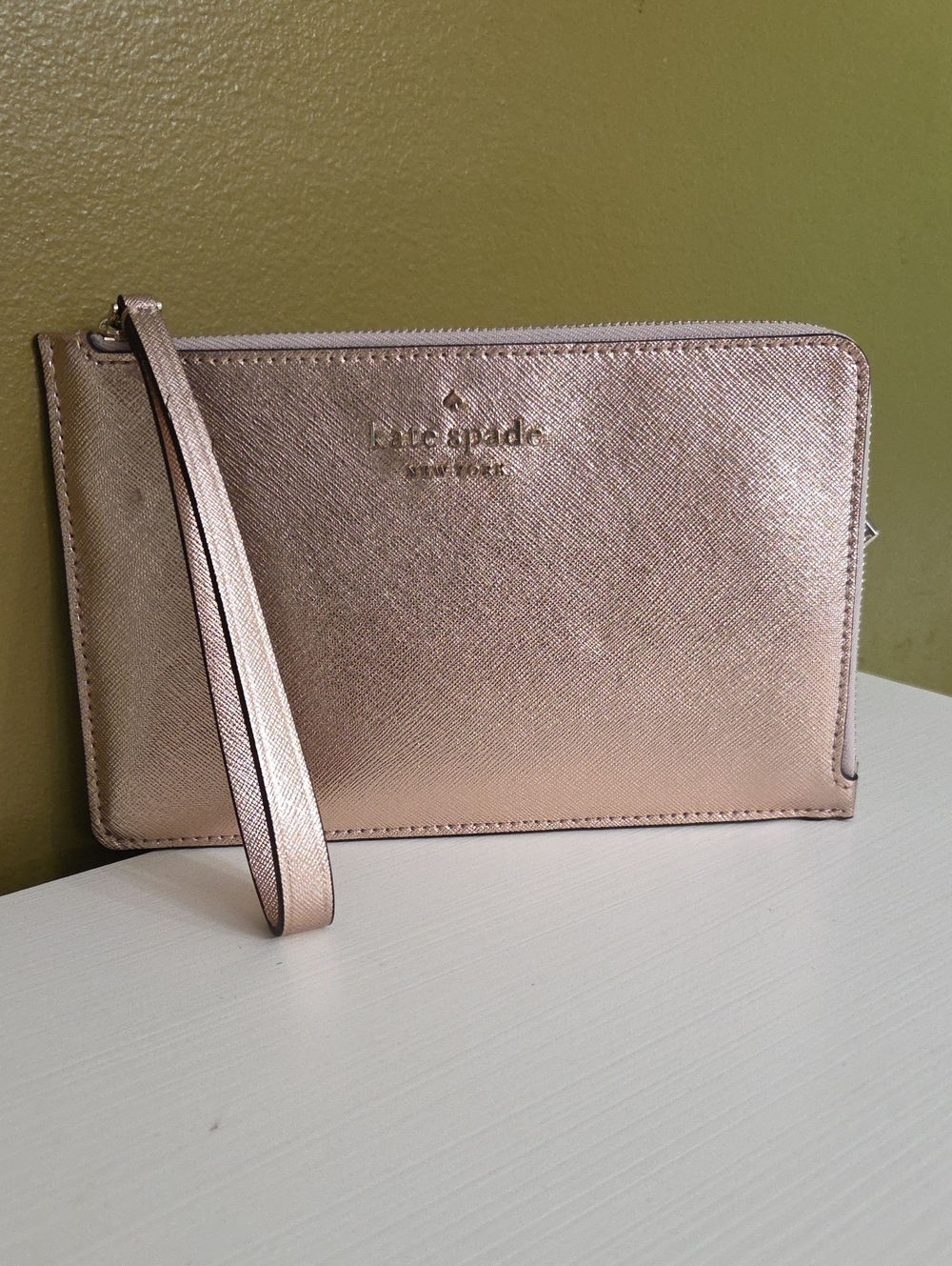 NWOT kate spade Metallic Rose Gold Wristlet Clutch